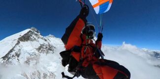 South African Pierre Carter becomes the first to legally launch a paraglider from a summit of Everest