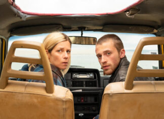 “Freewheeling”: two lost in Volvo on the diagonal of the void