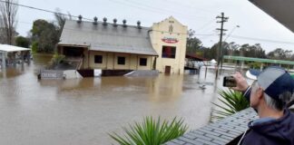 In Sydney, thousands of residents called to evacuate their homes because of the floods